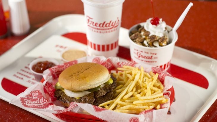 Freddy's original double combo meal with Fries. Turtle sundae in the background.